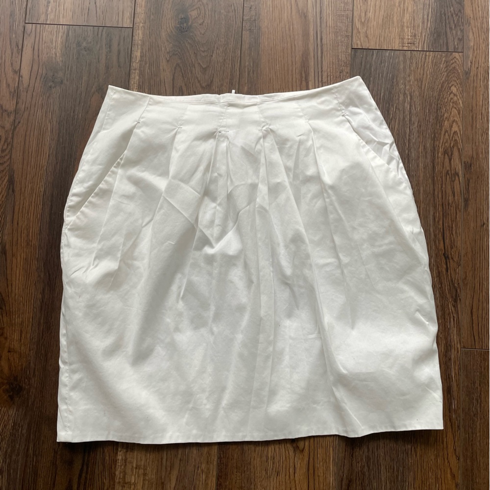 White Hugo mini skirt measured at about 26” waist